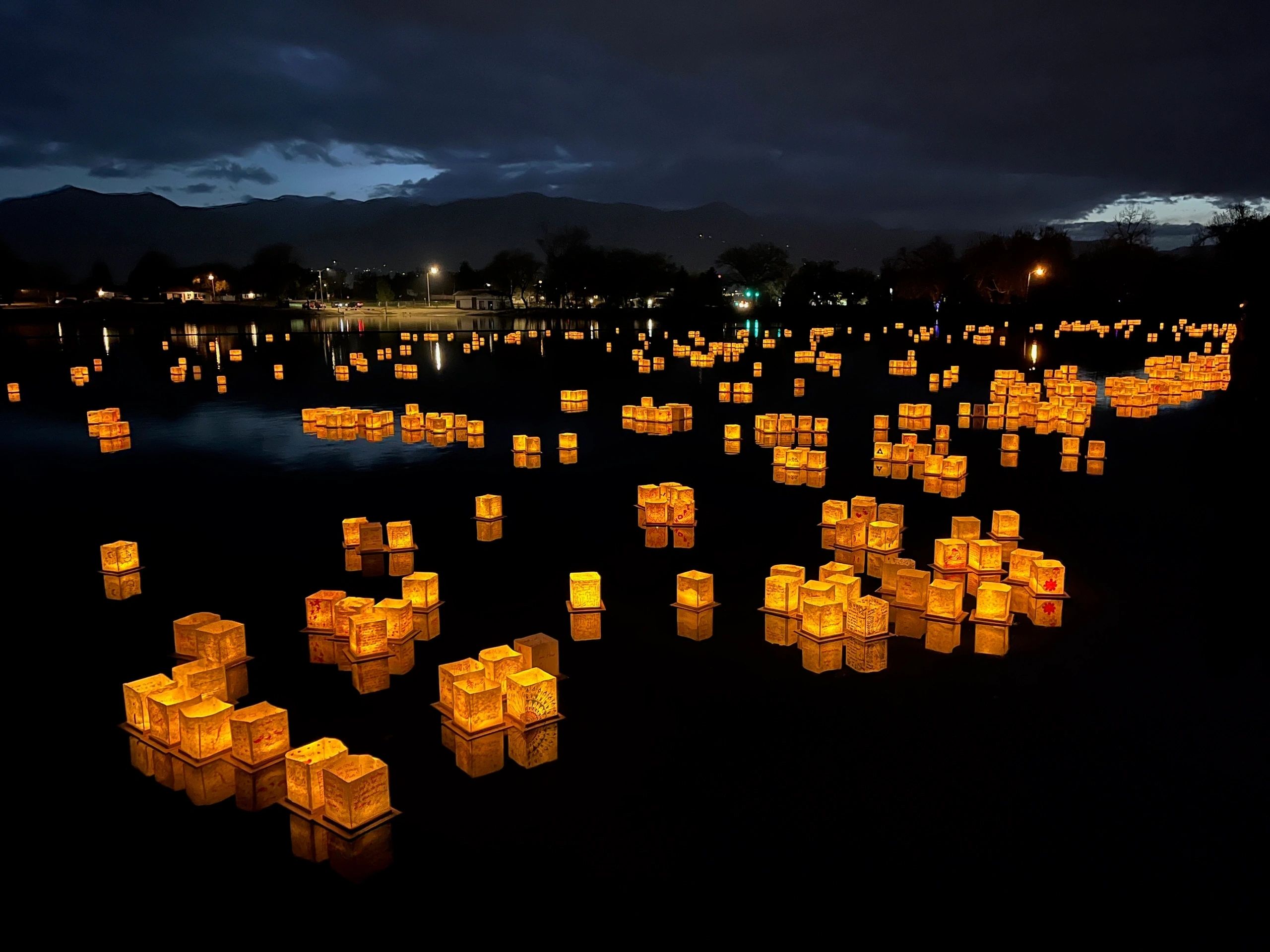 Lantern festival lights on the water at night